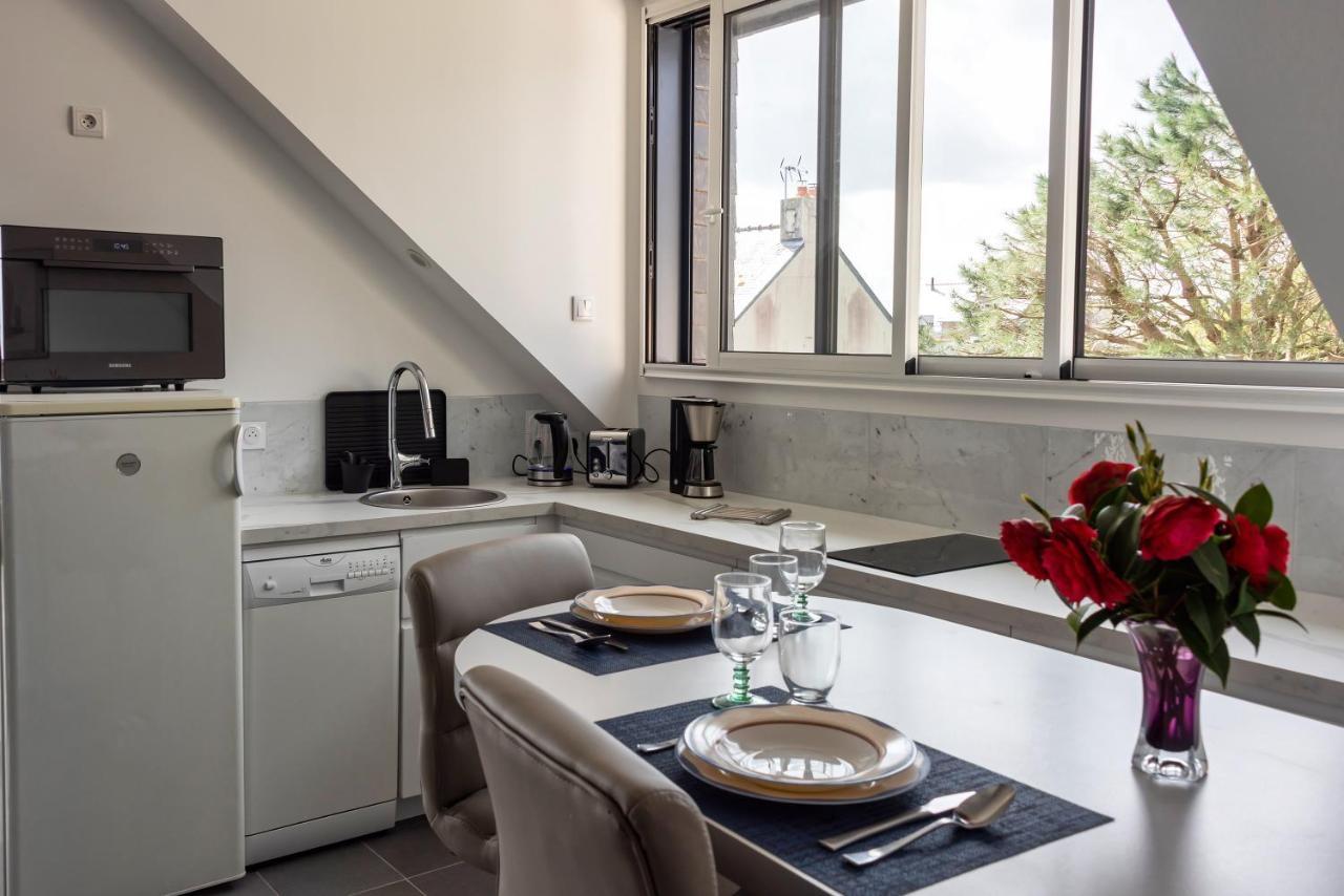 L'Abri Du Bon Vent Apartment ก็องแกล ภายนอก รูปภาพ